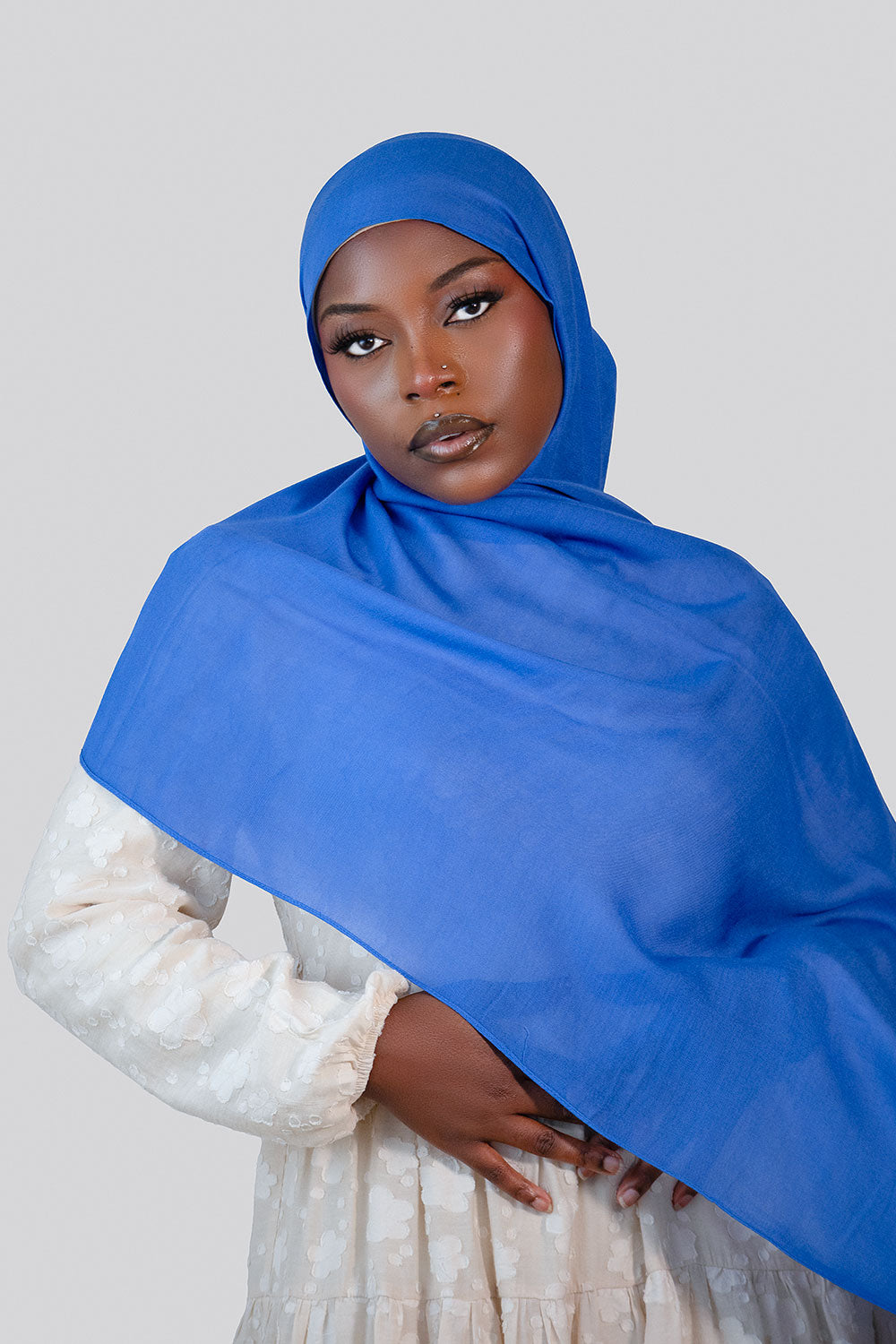 Woman wearing a blue modal  hijab 